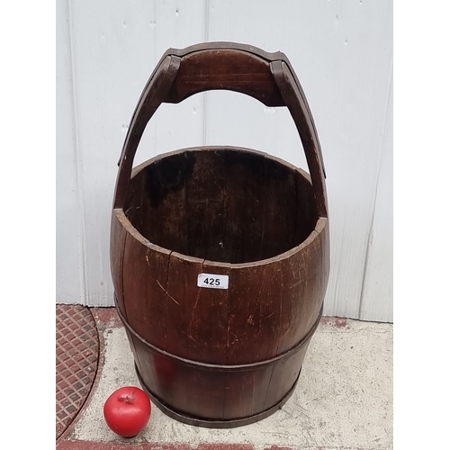 425 - Antique large Chinese coopered bucket with a robust handle. Traditional design.