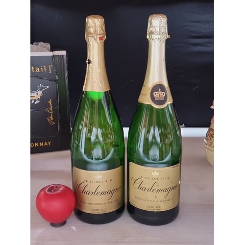 433 - Two bottles of Charlemagne Poire Mousseux Supérieur Demi Sec Sparkling Perry, each 1.5L. Produced by... 