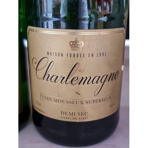 433 - Two bottles of Charlemagne Poire Mousseux Supérieur Demi Sec Sparkling Perry, each 1.5L. Produced by... 