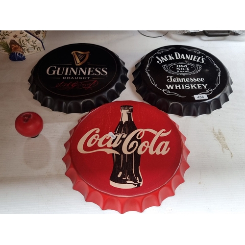 436 - Set of three metal wall signs in a bottle cap design, featuring Guinness, Jack Daniel's, and Coca-Co... 