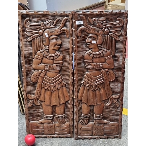 442 - Pair of intricately carved Central American wooden panels featuring relief figures in traditional at... 