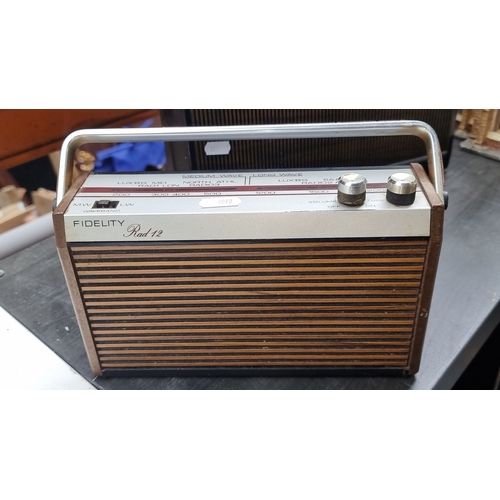 447 - Vintage Electronics Lot featuring a Fidelity Rad 12 radio, Vega portable transistor radio, and ELFto... 