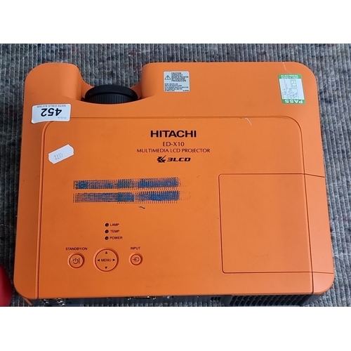 452 - Hitachi ED-X10 Portable LCD Multimedia Projector in orange features a high-resolution lens and multi... 