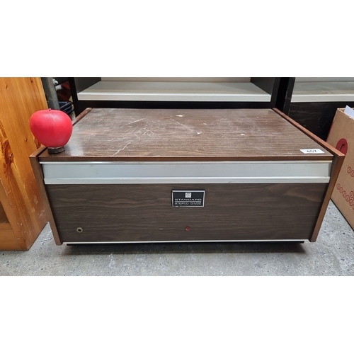 457 - Vintage Standard SR Stereo Console, solid-state AM/FM MPX with wood veneer casing, mid-century moder... 