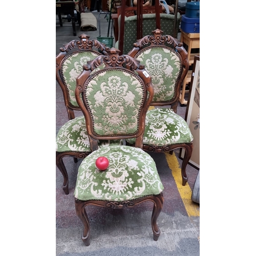 460 - Set of three Victorian walnut dining chairs with green and beige floral upholstery, featuring intric... 