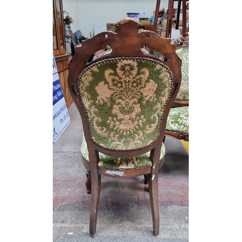 460 - Set of three Victorian walnut dining chairs with green and beige floral upholstery, featuring intric... 