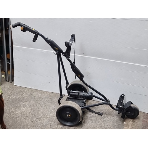 461 - Electric powakaddy golf trolley with foldable design, featuring a sturdy metal frame, ergonomic hand... 