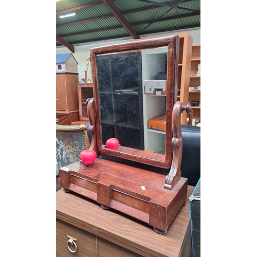 480 - A vintage mahogany dressing table mirror with adjustable reflective surface and two small storage dr... 