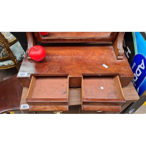 480 - A vintage mahogany dressing table mirror with adjustable reflective surface and two small storage dr... 