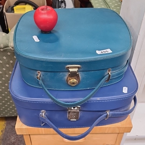 495 - Pair of vintage blue travel cases with handle. Each case features a secure latch and lined interior ... 