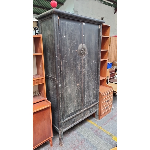 498 - Star Lot : Chinese antique wooden tall cabinet with metal hardware, dual front doors, two lower draw... 