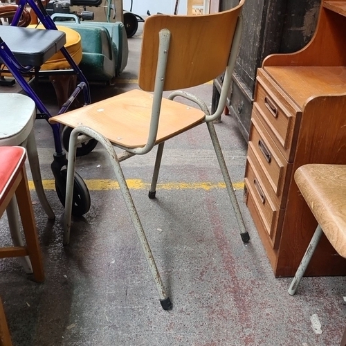 500 - Pair of vintage wooden school chairs with metal frames. Features a light wood finish and robust cons... 