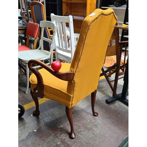 490 - Star Lot : A Stunning Goose neck chair with yellow upholstery its a lovely shape with curved legs an... 