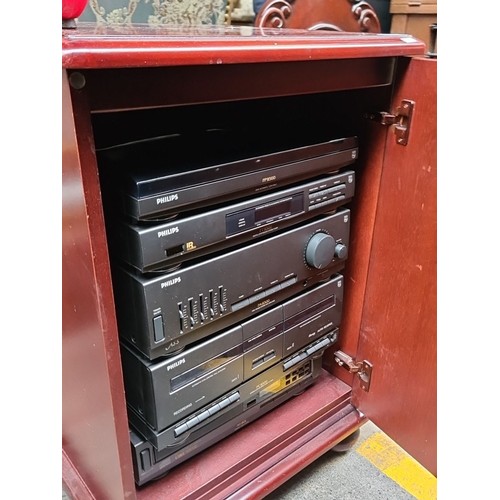 478 - Vintage mahogany cabinet with integrated Philips stereo system, featuring cassette deck, equalizer, ... 