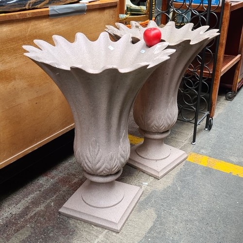 473 - Pair of decorative heavy plastic , fluted architectural planter. Each planter features a unique scal... 