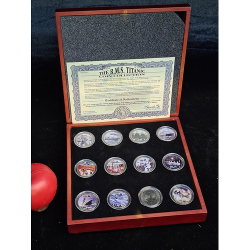 109 - A box set of the Morgan Mint R.M.S. Titanic Coin Collection with a certificate of authenticity.