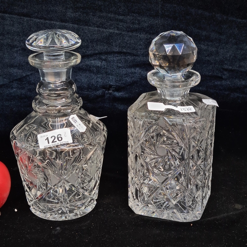 126 - Two very nice cut crystal decanters with original stoppers. Both in good condition. Would go perfect... 