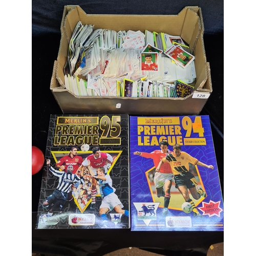 128 - A box comprising of two Merlin's Premier League Sticker Collection 94 & 95 books, along with a large... 