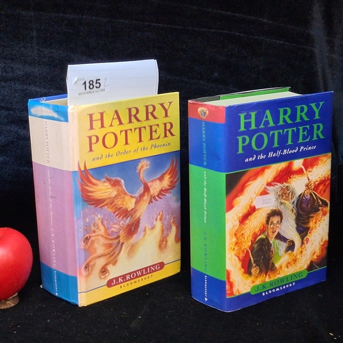 185 - Two hard back First Editions of J. K. Rowlings Harry Potter 