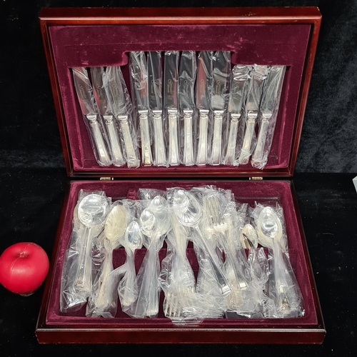 200 - A wonderful Grenadier branded cutlery canteen housed in a rosewood wooden presentation case.