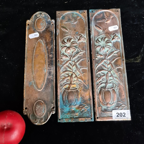 202 - Three original  copper Art Nouveau finger plates.