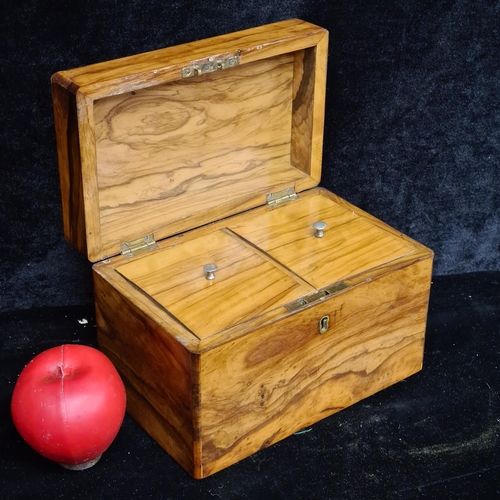 210 - Star Lot : A stunning Victorian flamed walnut tea caddy. Really fine example.