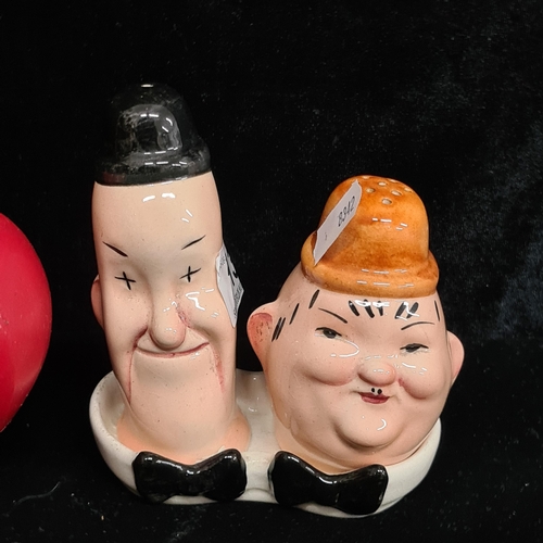 213 - A charming pair of vintage Beswick Laurel and Hardy salt and petter shakers.