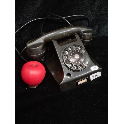 216 - A heavy original 1960's Bakelite rotary dial telephone.