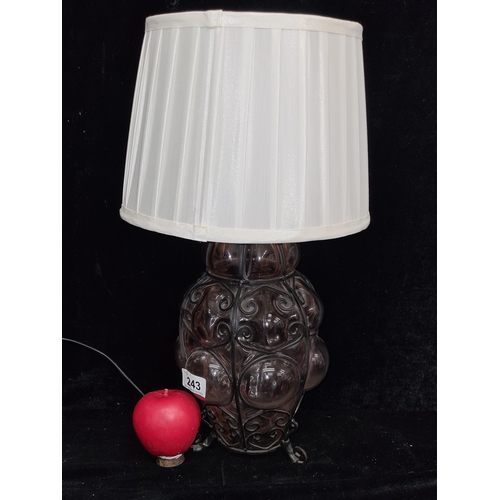 243 - A beautiful handblown caged Venetian pink glass table lamp.