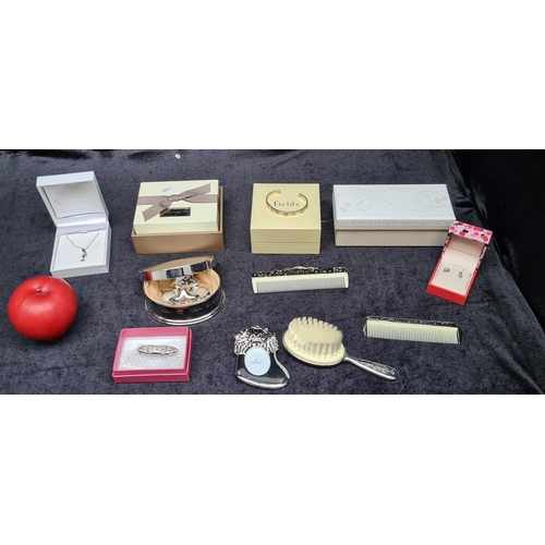 306 - A collection of boxed items inc Sterling Silver.