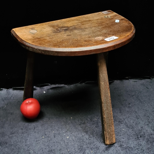 319 - A lovely antique hand made Milking stool. With fabulous patina. Beautiful shape to this.