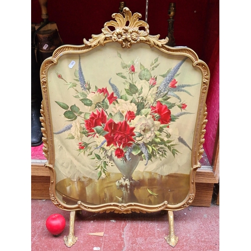 332 - A very elegant vintage Fire screen with Floral design and rococo frame.