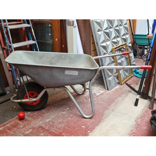 362 - A high quality large galvanized steel wheelbarrow.