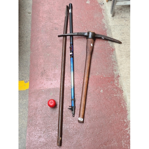 364 - A mixed lot of three items including a telescopic fishing rod and railway shifting bar.