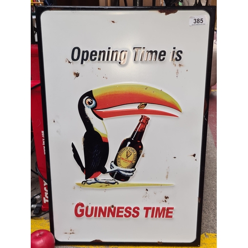 385 - A printed large metal wall sign advertising Guinness. Features the iconic Guinness Toucan.