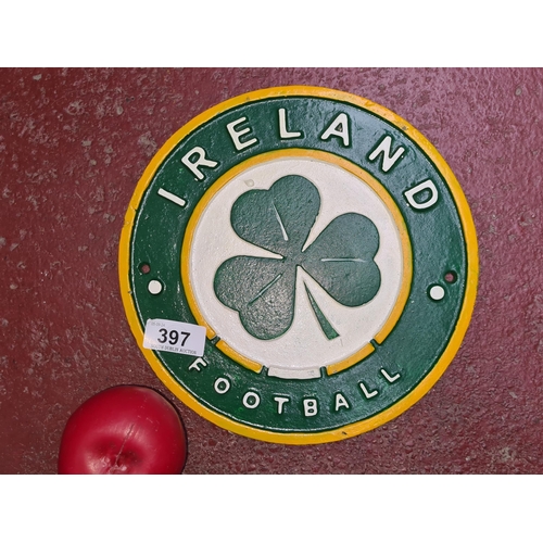 397 - A heavy cast iron wall sign reading 'Ireland Football'