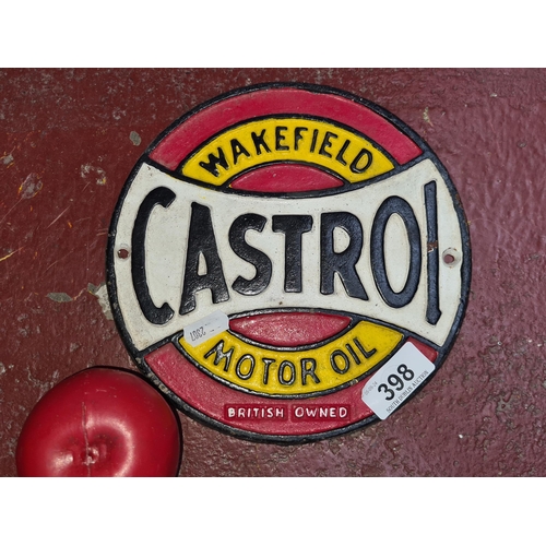 398 - A heavy cast iron wall sign advertising 'Castrol Motor Oil'