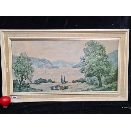 98 - A charming large vintage print of a lakeside landscape. Housed in a cream and linen frame.
MM: 92cm ... 