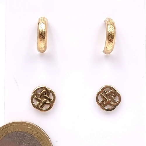 22 - Two pretty pairs of nine carat gold earrings including a studded example of a Celtic knot and miniat... 