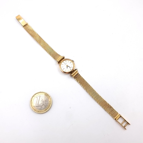 26 - Star Lot :A beautiful vintage Omega Swiss made ladies wrist watch with mesh straps and baton dial.