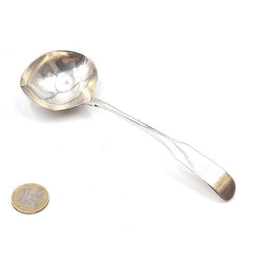 39 - A nice example of a sterling silver sauce/spoon ladle hallmarked Dublin dated 1806. Dimensions: Leng... 