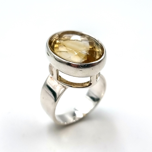 45 - A nice example of a citrine stone ring mounted in sterling silver. Ring size - R 1/2. Weight - 11.36... 