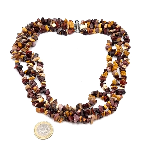 60 - A Mookaite torsade necklace with sterling silver clasp. Boxed. Weight 100.94 grams.