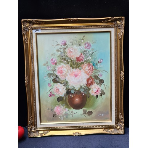 297 - A graceful oil on canvas painting. Features a still life botanical study of flowers in a vase. Rende... 