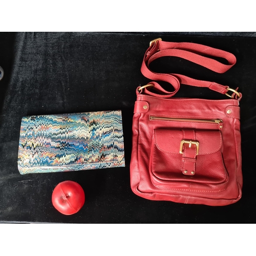 717 - Two stylish ladies handbags including a L.K. Bennett clutch example.