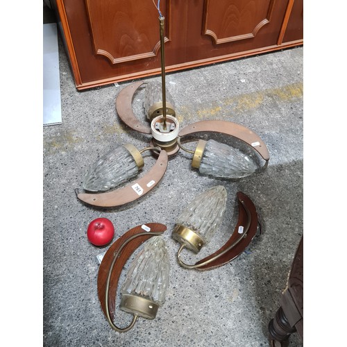 761 - Mid Century teak, brass and glass cone light fittings. Includes a three armed ceiling pendant light ... 