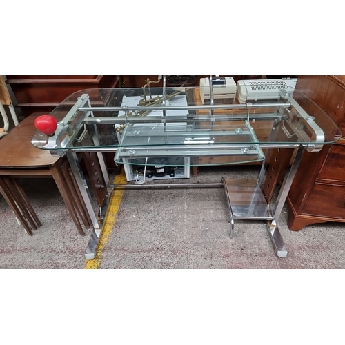 640 - Glass and metal computer desk with floating shelves and chrome supports. Patented design referenced ... 