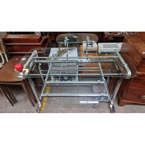 640 - Glass and metal computer desk with floating shelves and chrome supports. Patented design referenced ... 