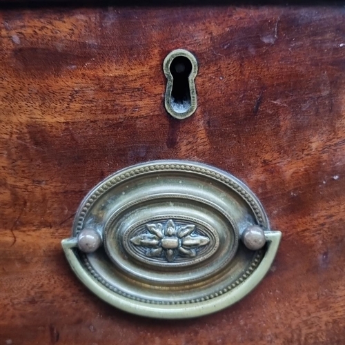 643 - Star Lot : Georgian mahogany bow-front chest of drawers with brass oval handles, featuring two short... 