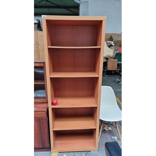 648 - Wooden bookshelf with five adjustable shelves, made from pressboard and laminate, in a light oak col... 